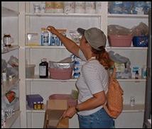 Debbie stocks the shelves